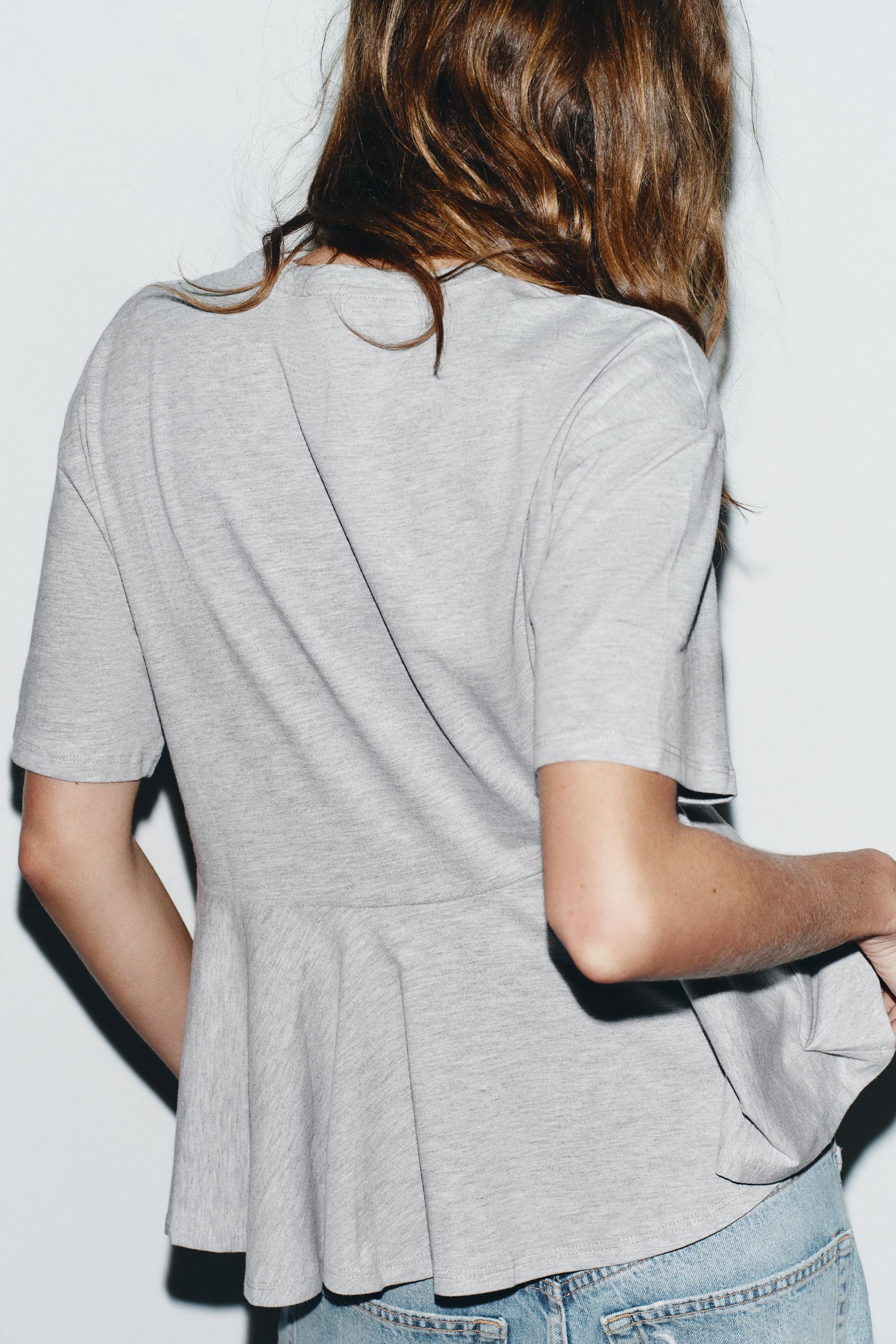 HAUT VARSITY À VOLANT